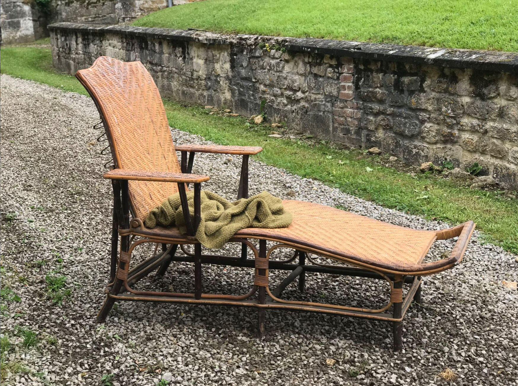 Old rattan lounger.