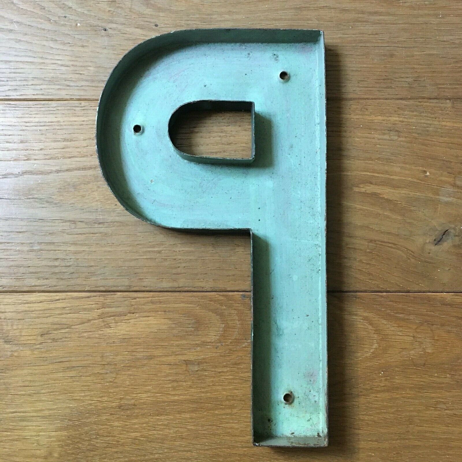 Ancient letter sign metal P