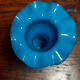 Blue opaline vase, opaque glass, wavy neck/rim, relief decoration of a bow.