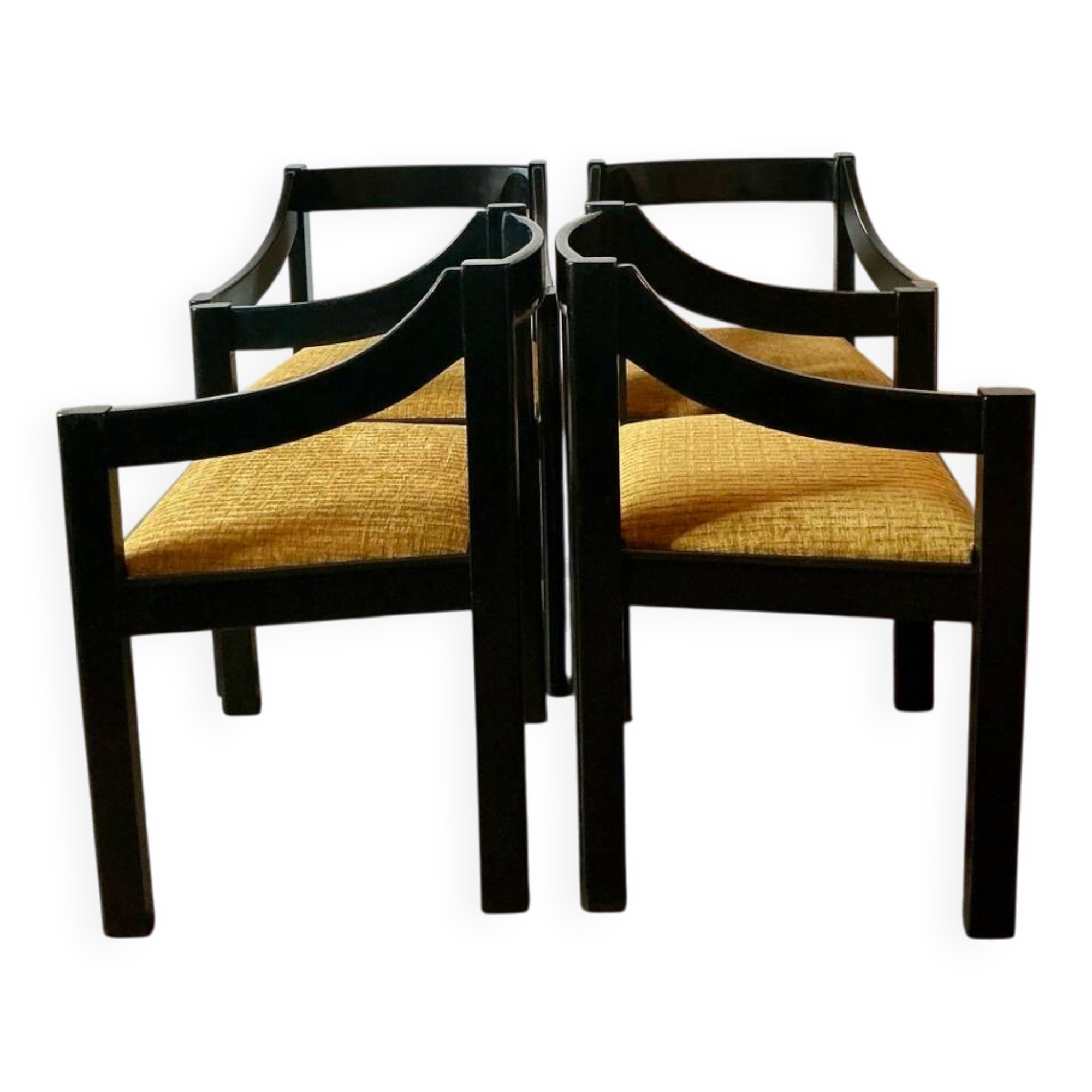 Four designer armchairs