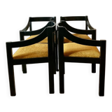 Four designer armchairs