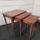 Nest of tables in solid cherry wood from the mid-20th century.