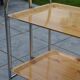 Folding dessert trolley on chrome metal wheels and formica.