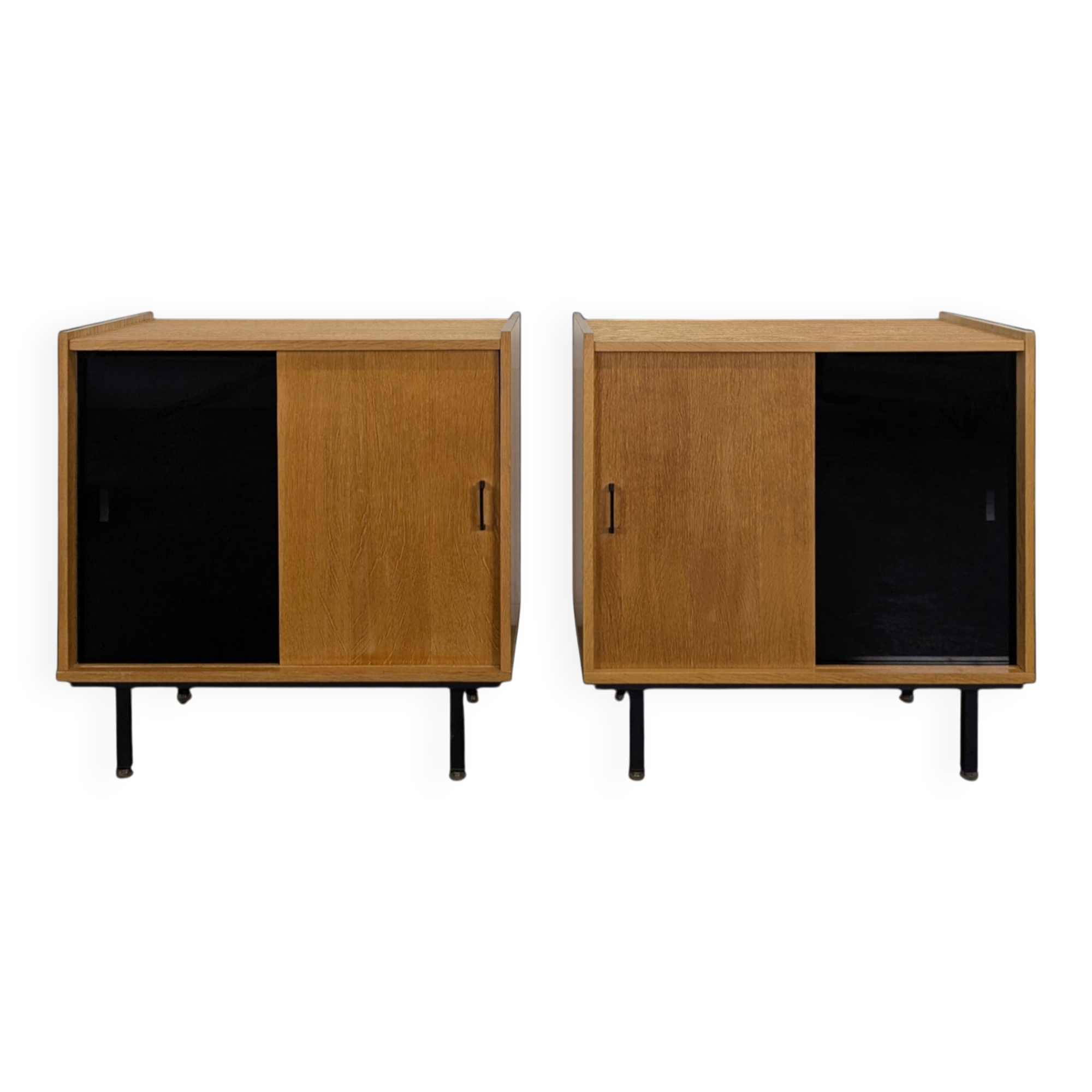 Pair of modernist sideboards with black glass doors in oak veneer.