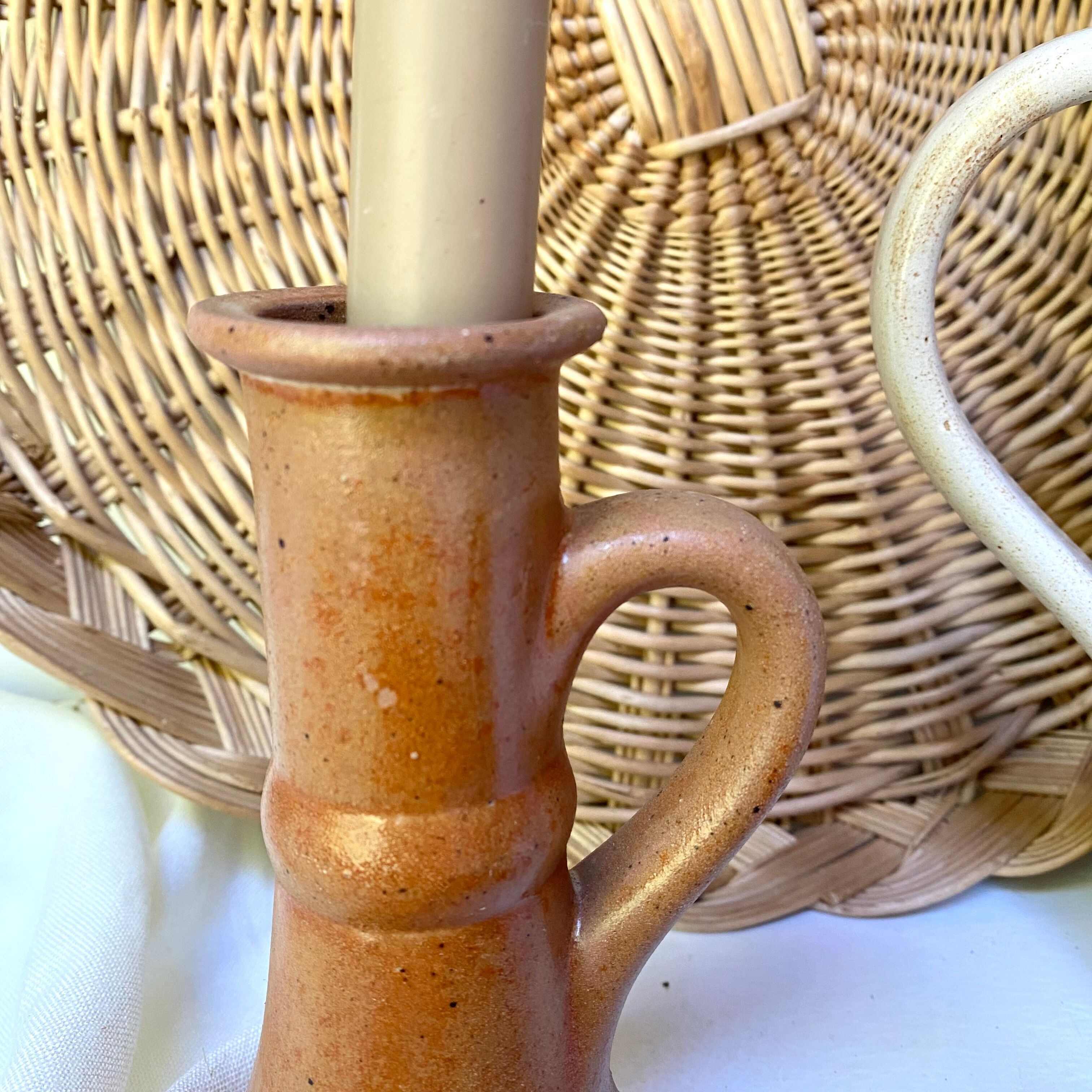 Pair of bohemian sandstone candle holders