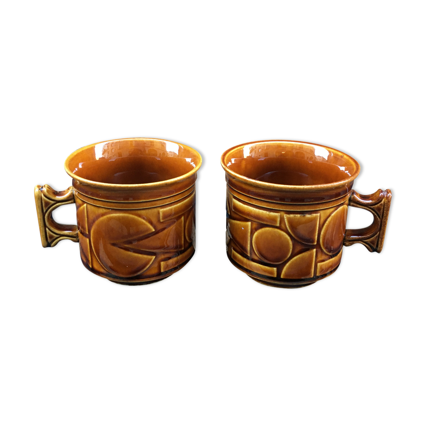 Two brown coffee cups