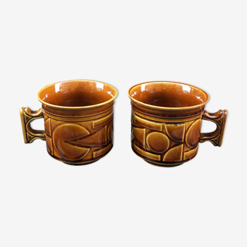 Two brown coffee cups