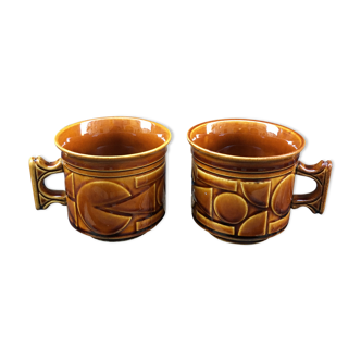 Two brown coffee cups