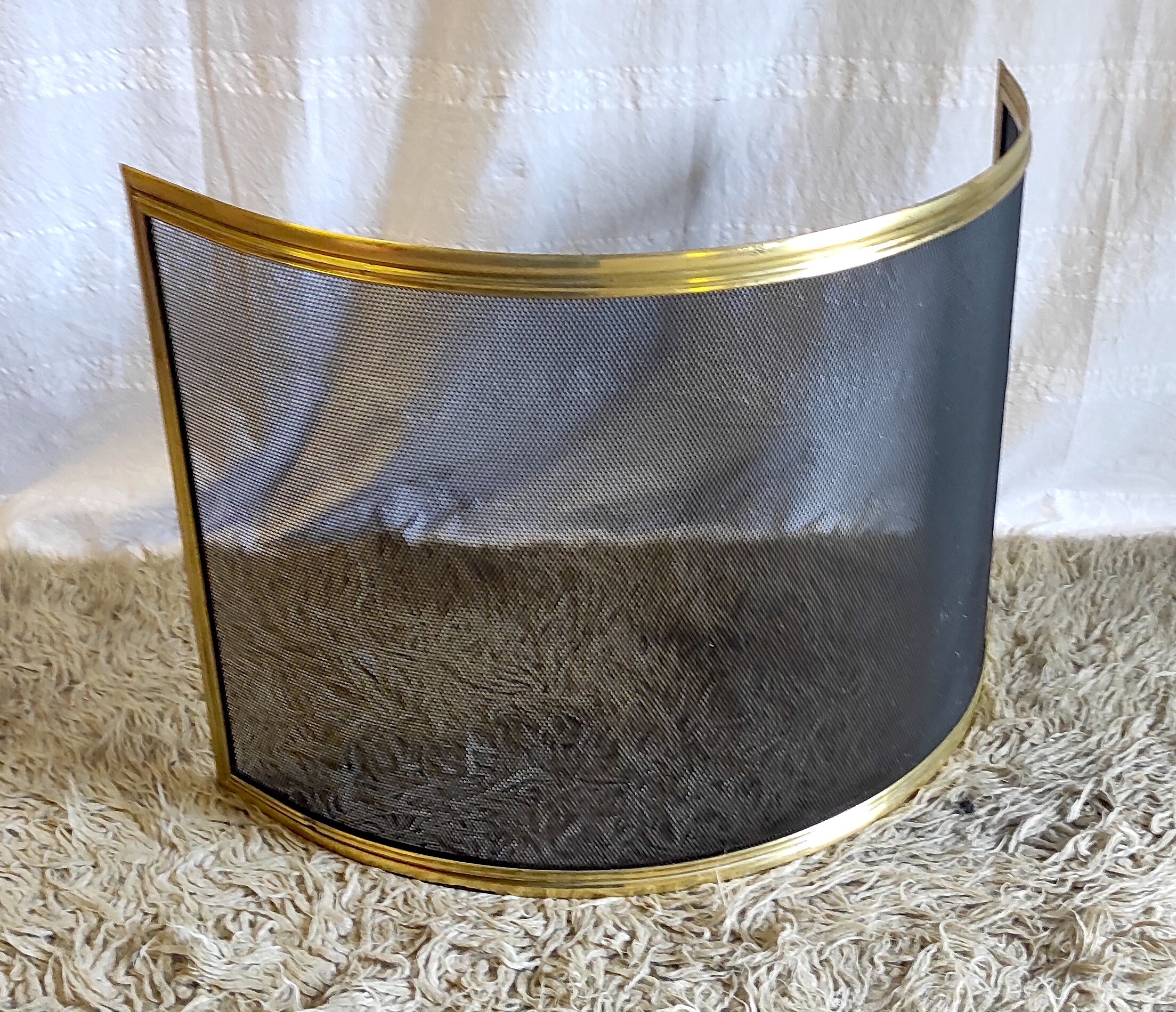 Brass bow firewall and metal mesh