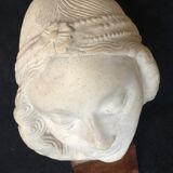 Bronze-middle-aged woman's head in plaster