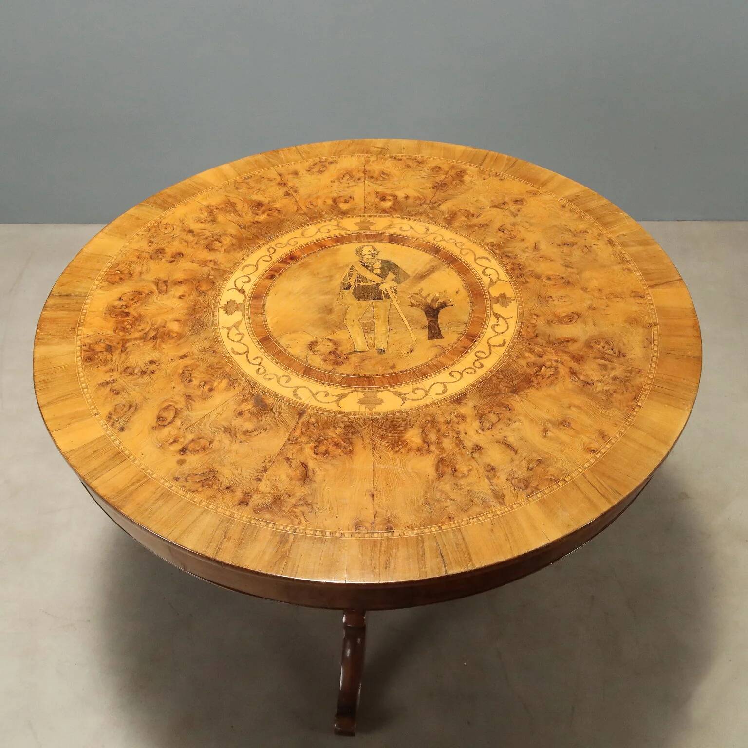Round walnut table with marquetry of Vittorio Emanuele II