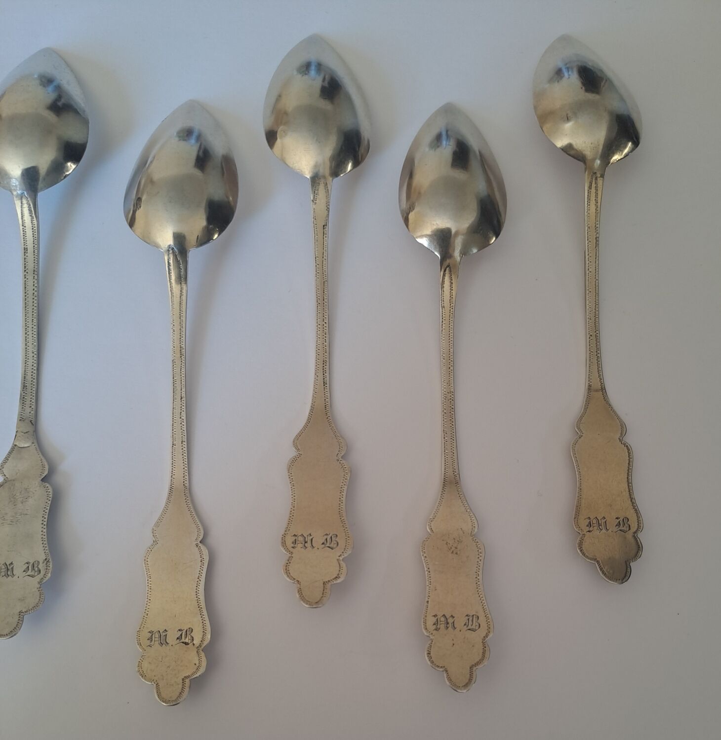 6 small numbered silver teaspoons, Minerva hallmark.
