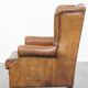 Sheepskin wingback chair in good condition