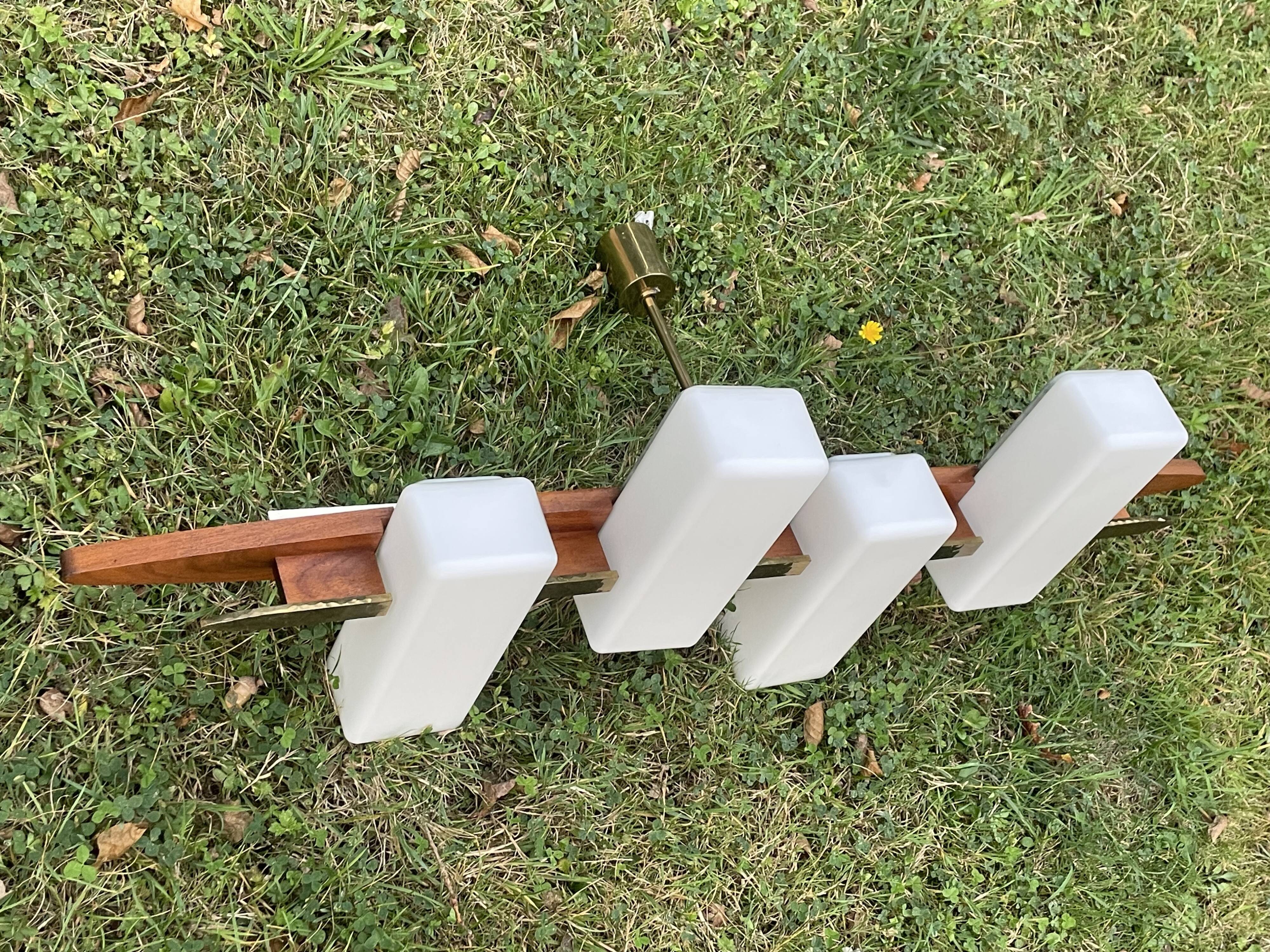 Scandinavian chandelier, brass, precious wood, 4 lights, shuttle 102 x 35 x 9 cm