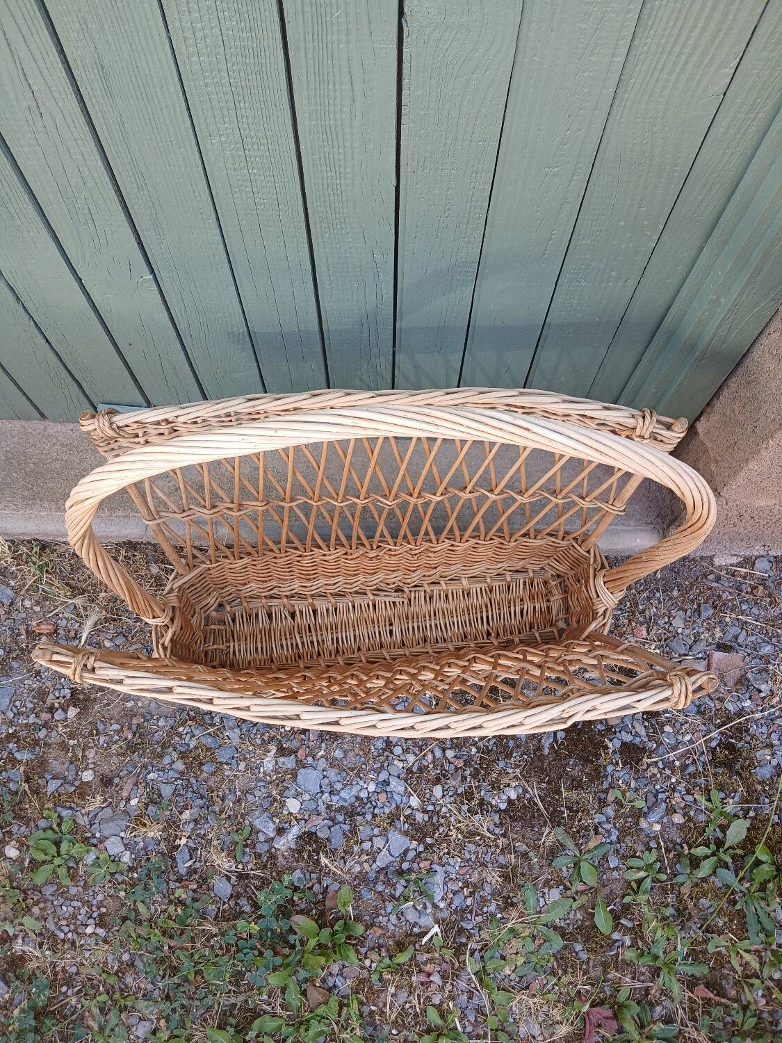 Antique wicker magazine rack