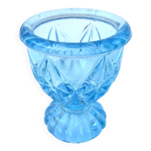 Old footed egg cup with fluted design, transparent blue glass.