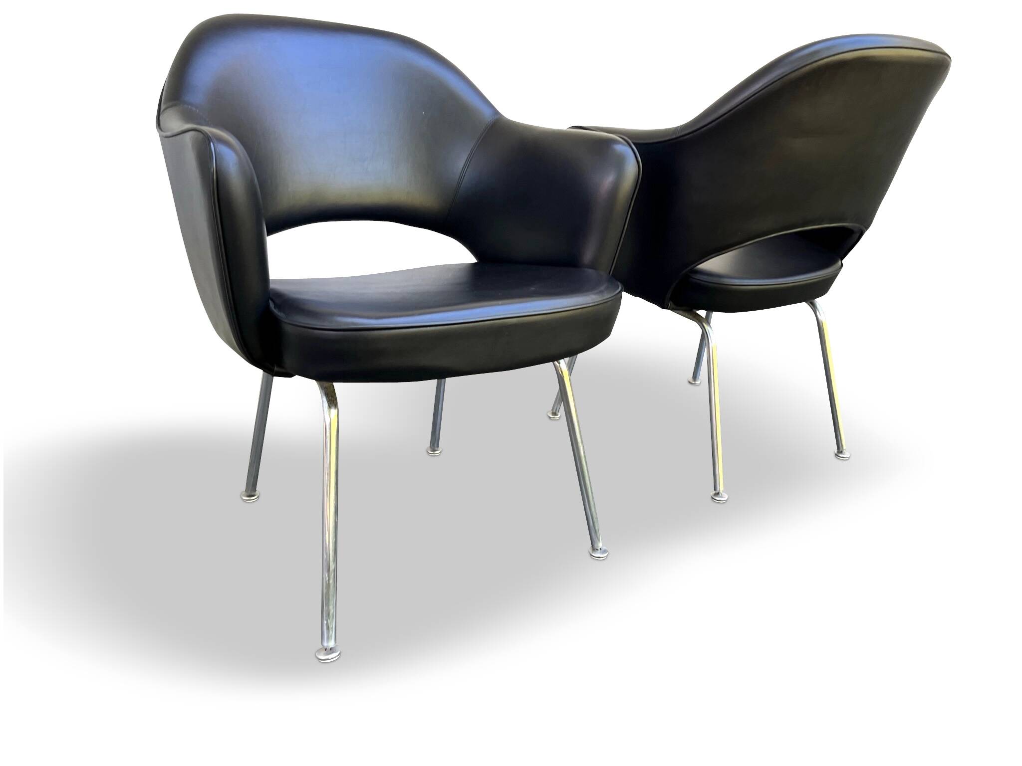 Pair of "Conference" armchairs by Eero Saarinen for Knoll International, black and chrome