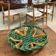 Woven green fruit bowl from the 1950s.