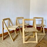 Folding chairs designed by Aldo Jacober in solid beech wood.
