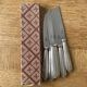6 Ravinet d'Enfert knives with silver metal handle and stainless steel blade