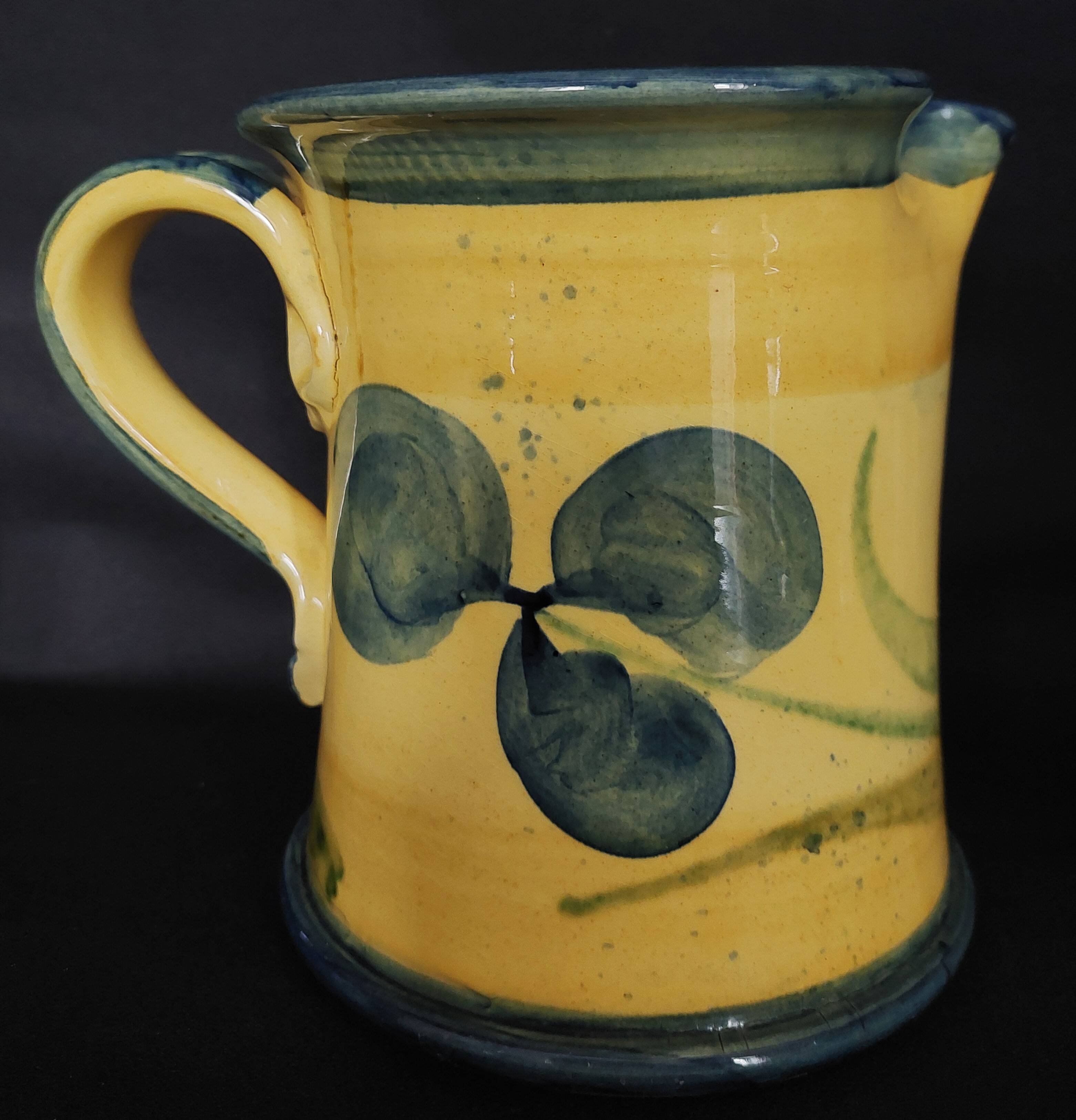 Vintage earthenware pitcher with a glossy finish, signature to be identified, 20th-century ceramics.