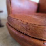 Fauteuil club en cuir patiné