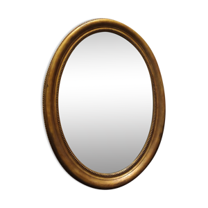 Miroir doré médaillon