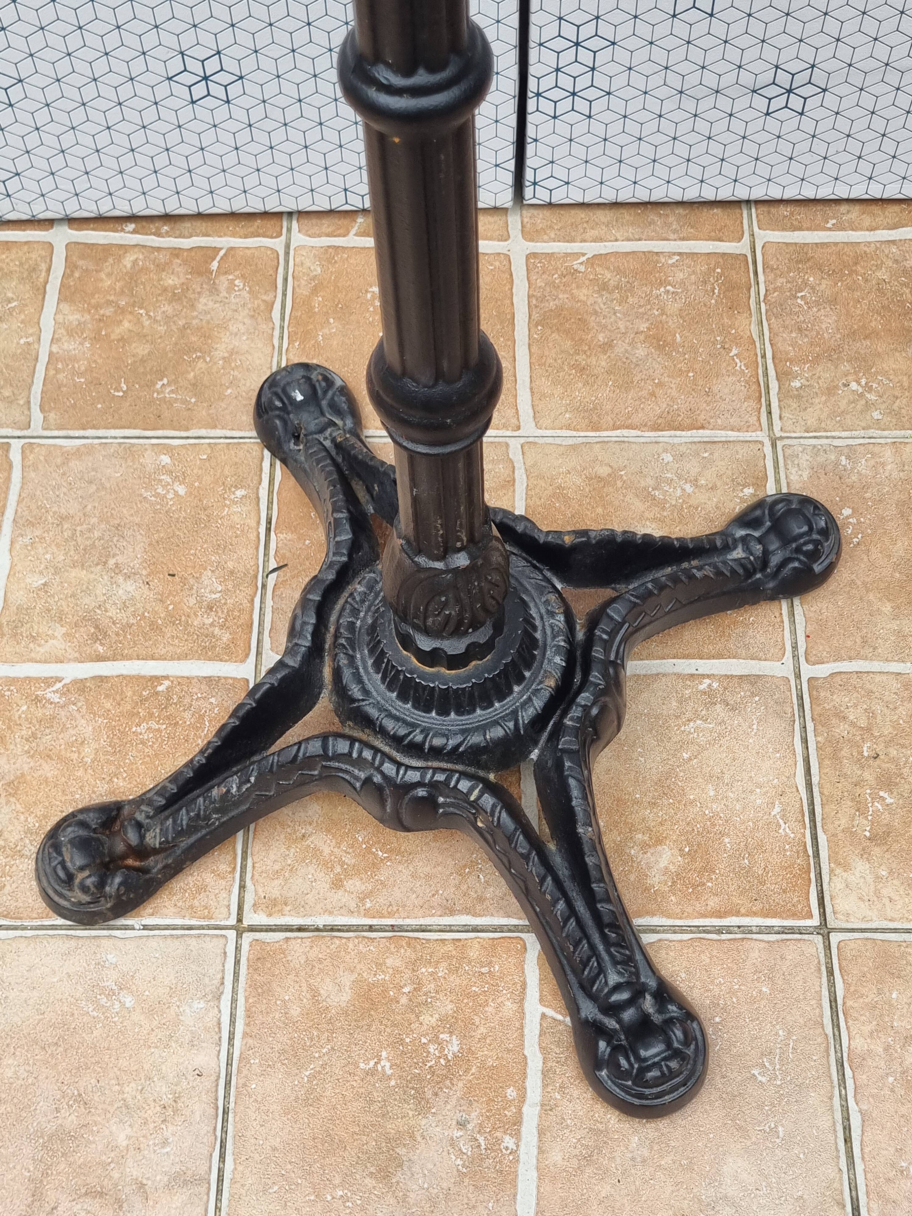 Vintage cast iron and brass "standing" bistro table, 109 cm