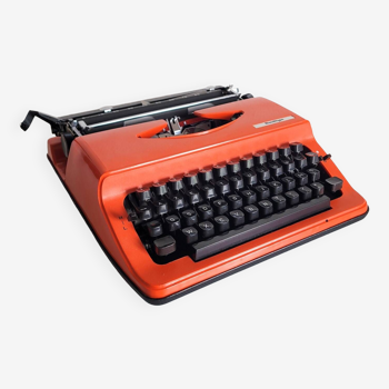 Machine a ecrire orange monditype 70s