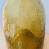 Amber colored Biot bubble glass bottle