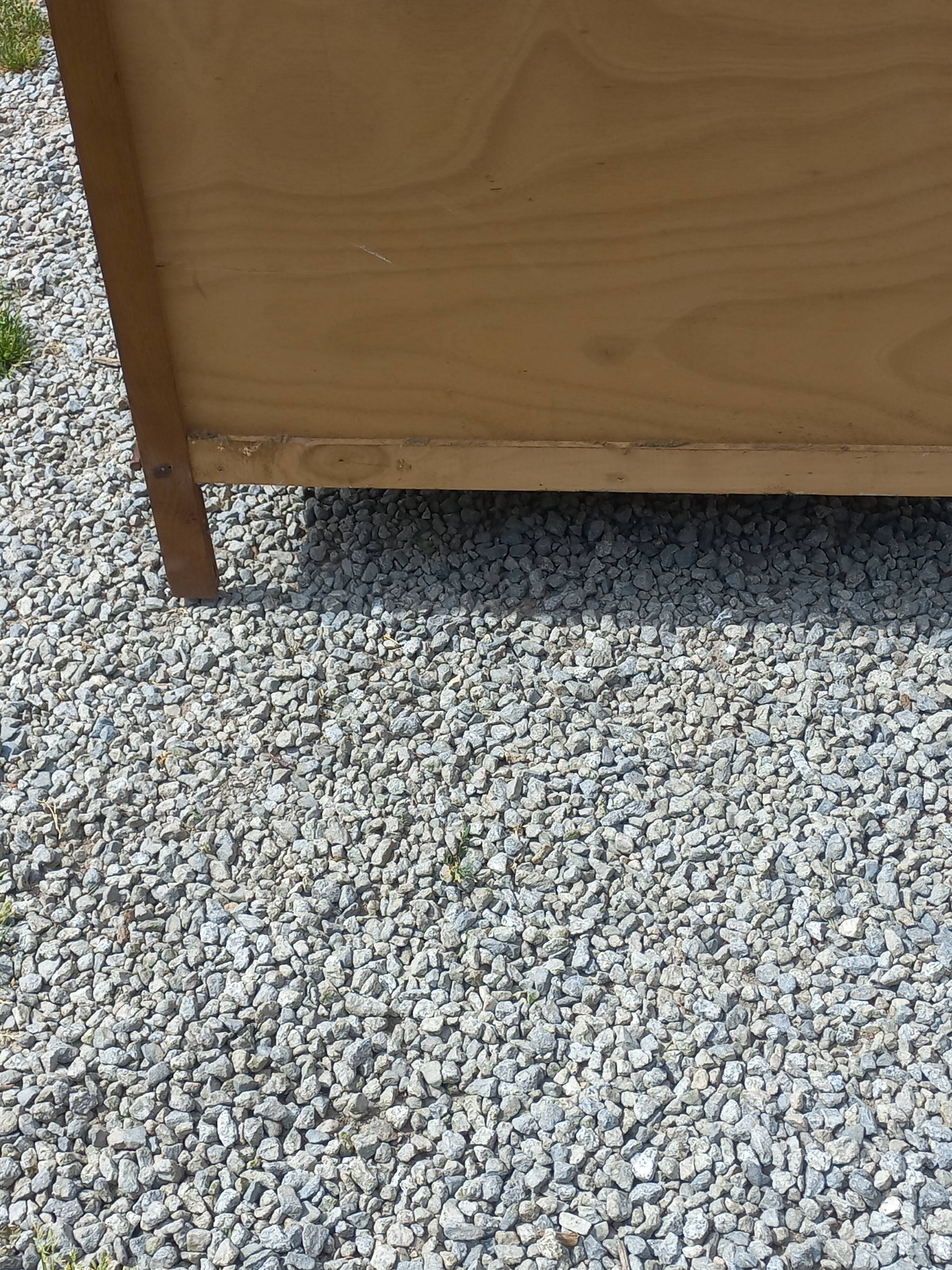 Vintage oak commode with tapered legs from the 1950s.
