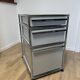 USM Haller pedestal in light grey