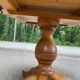 Round table in solid pine with a central baluster leg from 1980.