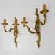 Antique pair of double-light bronze wall sconces with acanthus leaves. 1950s
