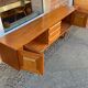 Atypical teak row of the 60s