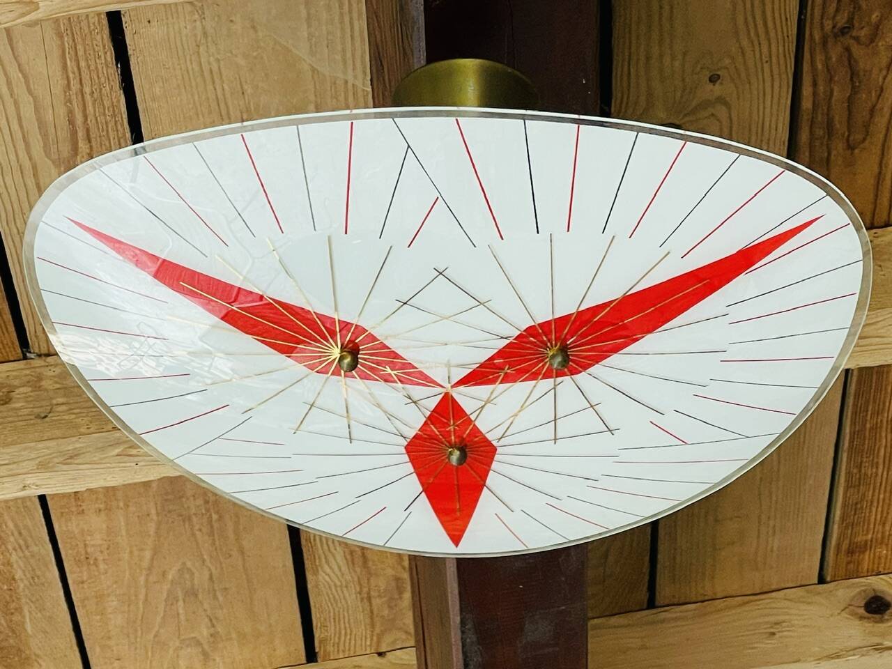 Vintage triangular ceiling light in glass and brass circa 1970s.