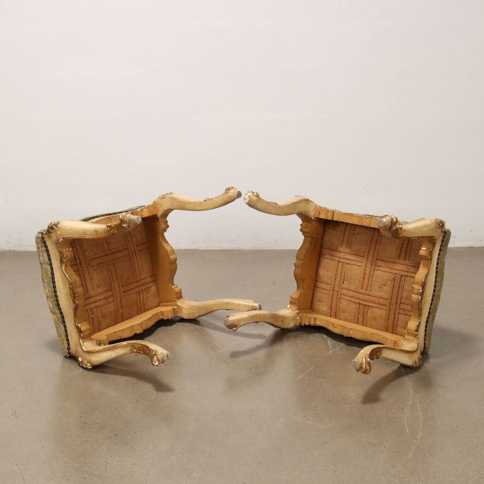Pair of antique baroque-style poufs in gilded wood, 19th century.