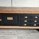 Old workbench furniture with six drawers and a door