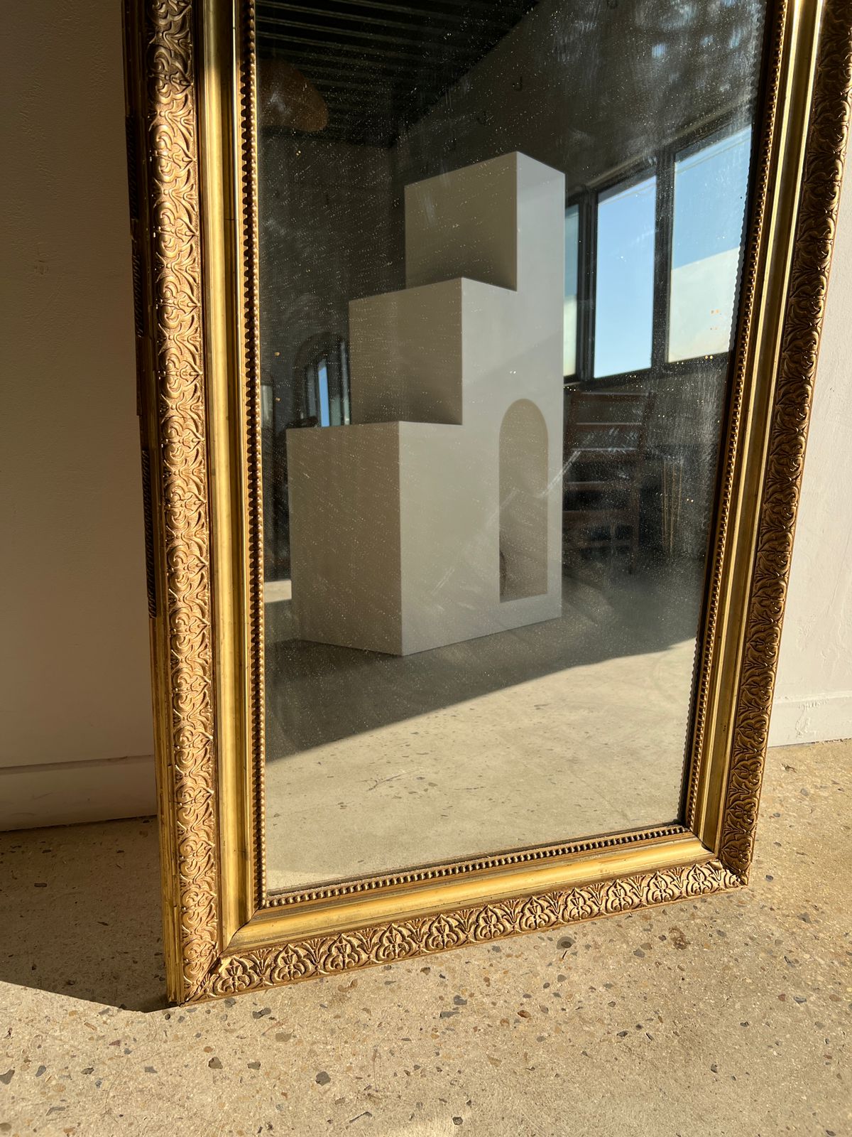 Gilded mirror with frieze h2m10 l:73cm