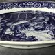 Blue enamelled earthenware wall dish with peasant scene decor Boch La Louvière