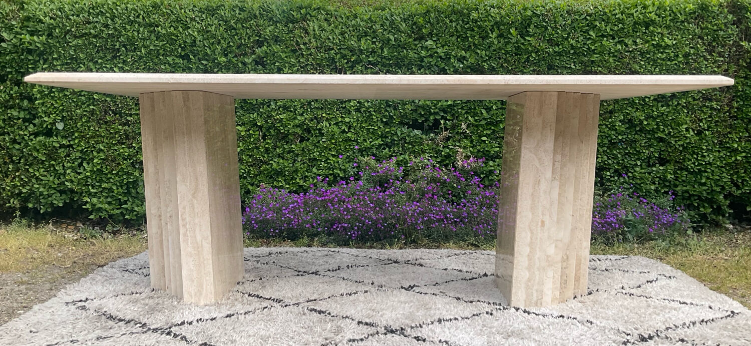 Large vintage dining table in travertine in the 1970s Carpa style.