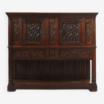 Neo-gothic cabinet in oak with rich decorations and hidden storage, France, 1850s