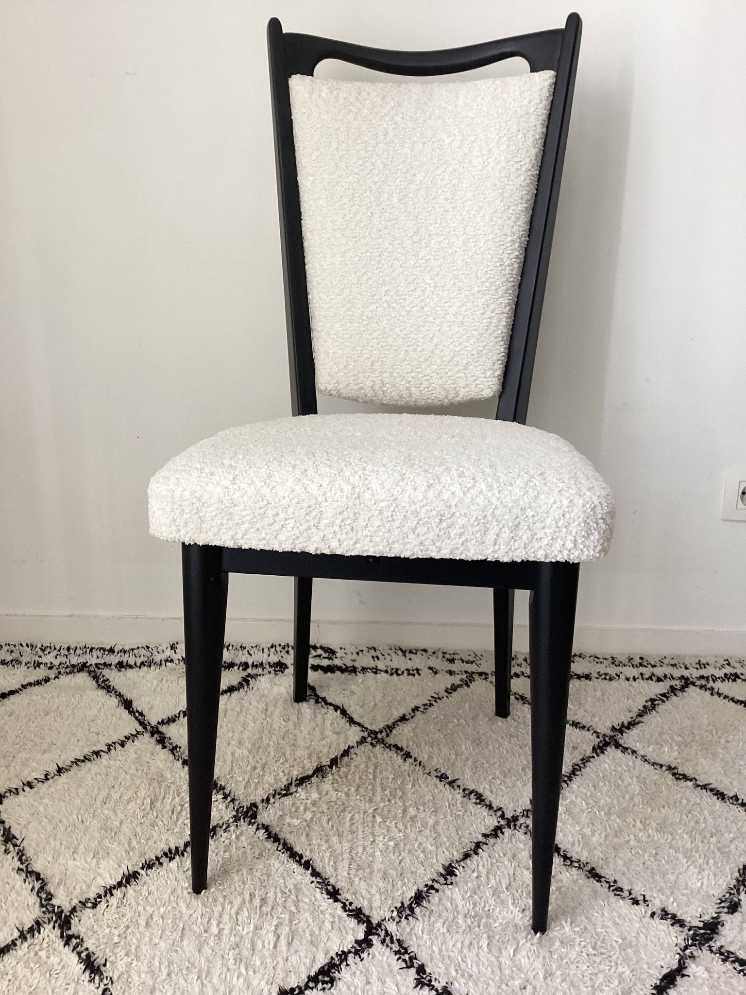 Fully restored vintage chair in boucle fabric.