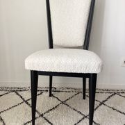 Fully restored vintage chair in boucle fabric.