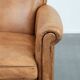 Beautiful subtle vintage sheepskin armchair with elegant legs