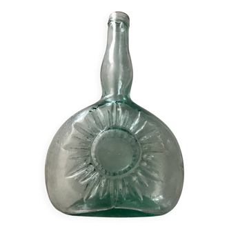 Bouteille vintage embossage soleil