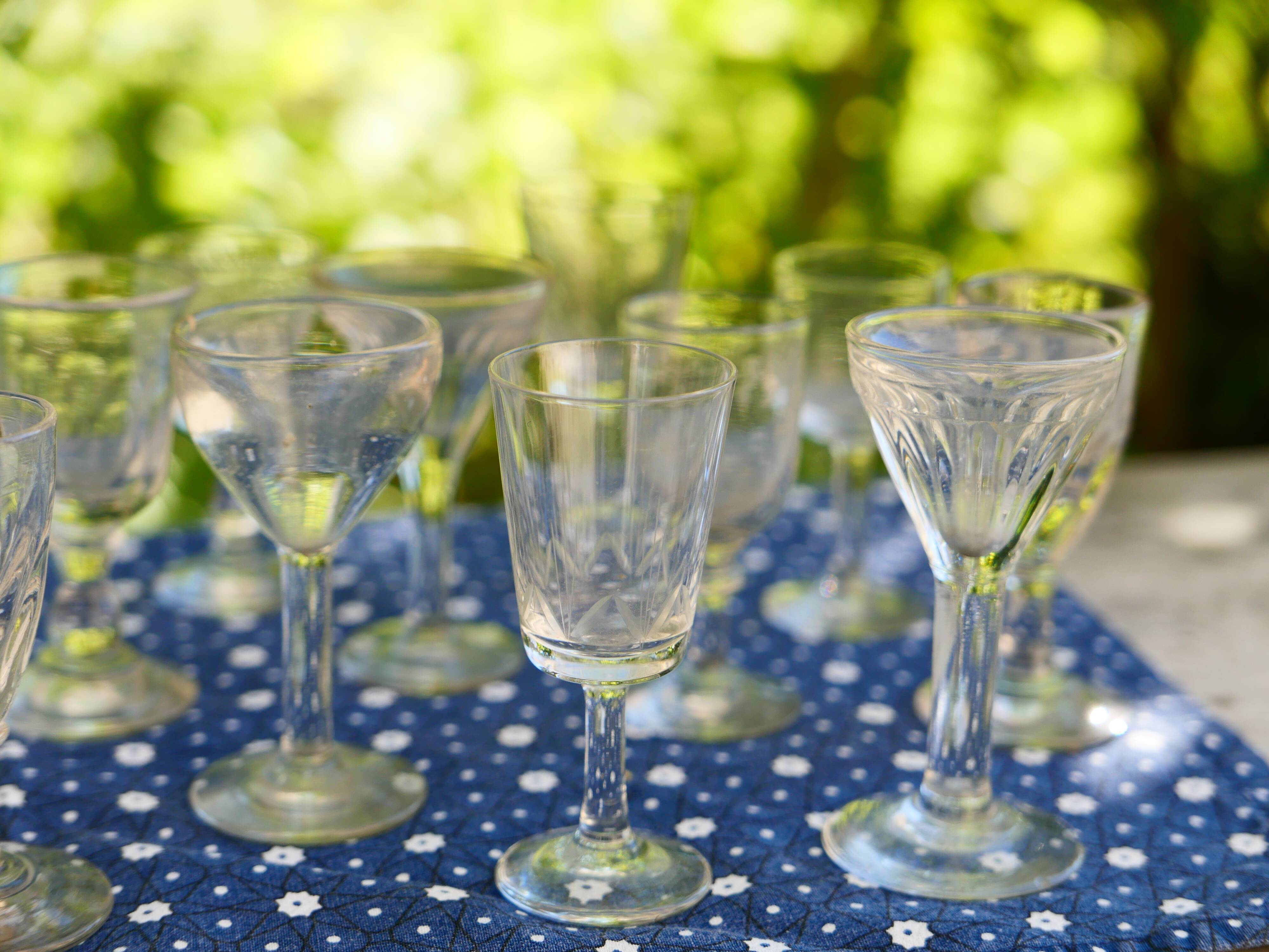 Assortment of 15 mismatched vintage liqueur glasses