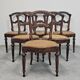 Set of 6 antique dining chairs in solid walnut, cane seats, 19th century.