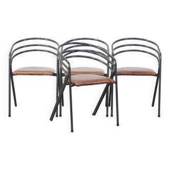 Lot de 4 chaises de salle à manger design années 70 avec assise en cuir et structure en métal