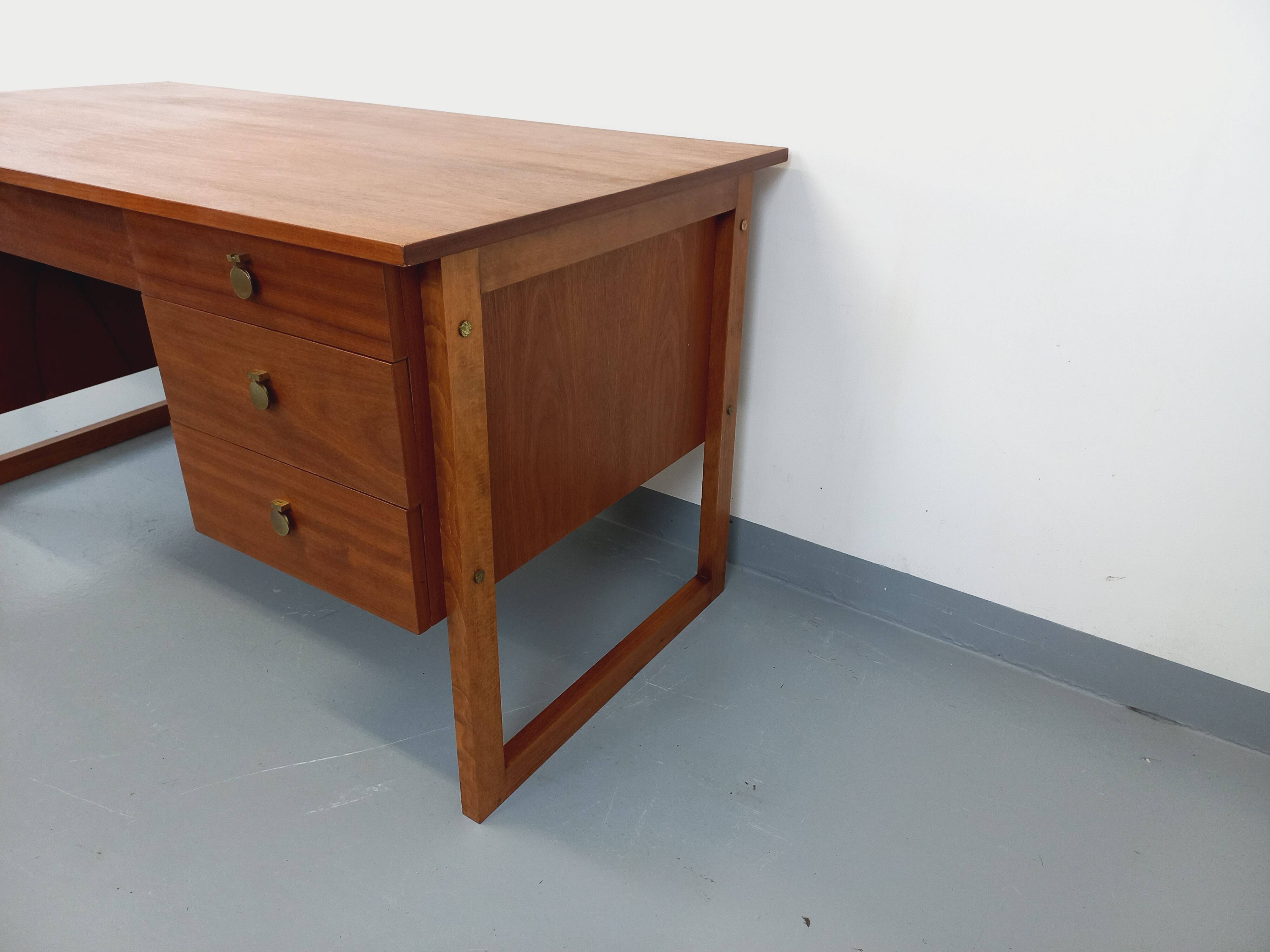 Double-sided executive desk sled legs vintage Scandinavian style in teak from the 60s